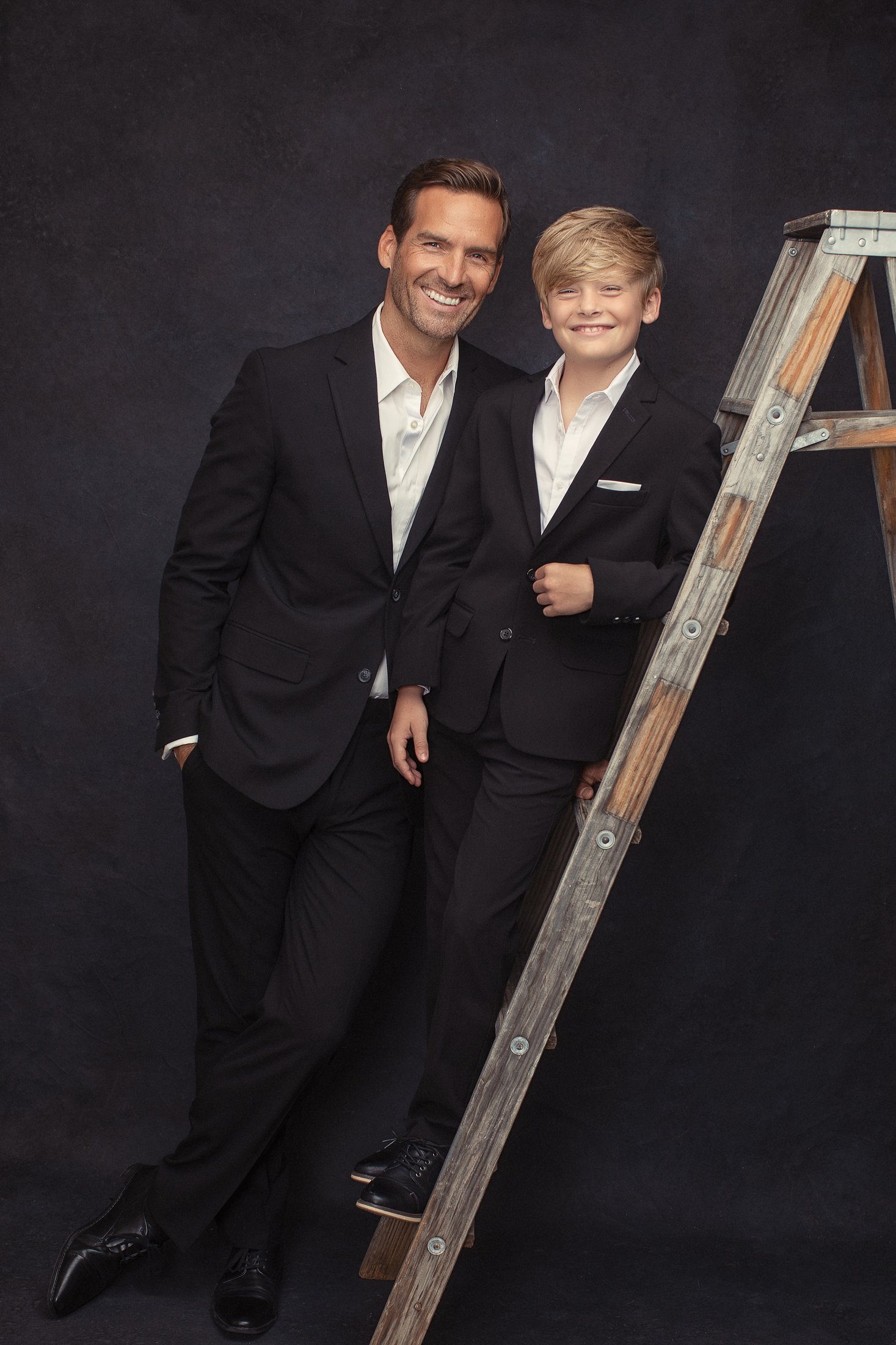 Father and son portrait with a wooden ladder, Dallas photography studio