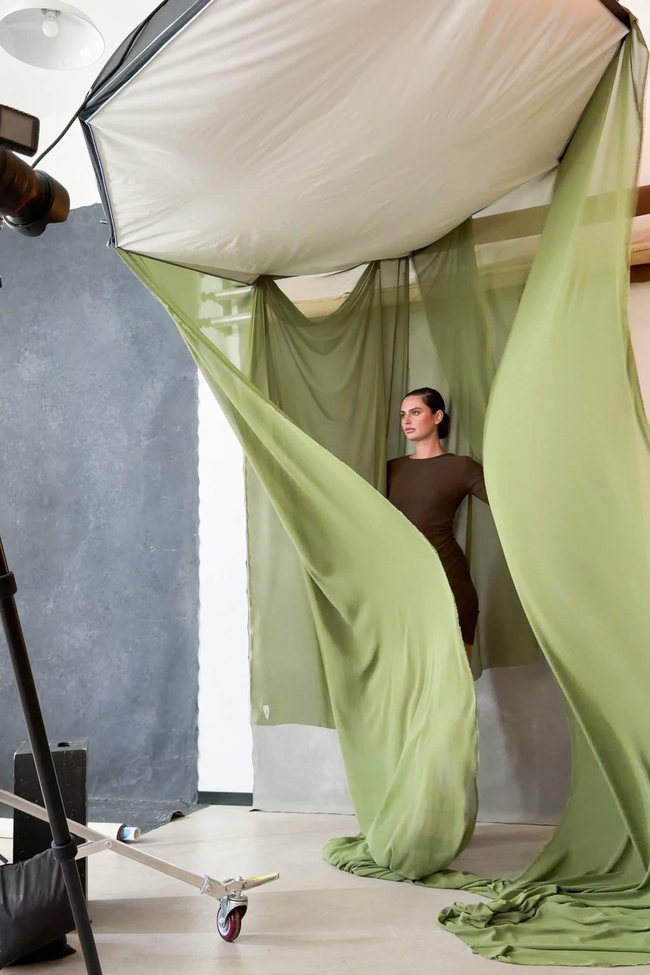 Behind the scenes: green silk chiffon draped from an octabox with fans, AJK Images studio