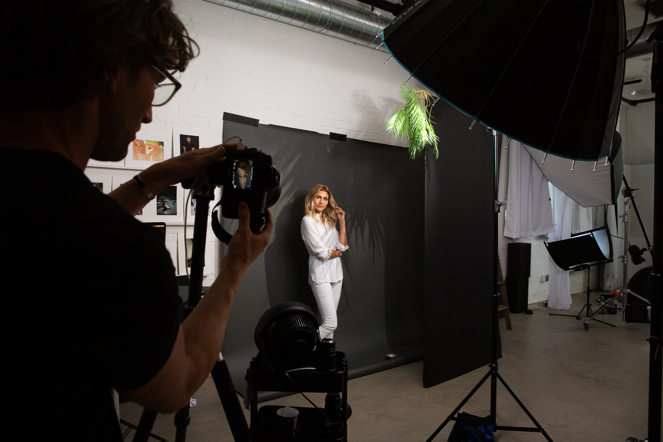 Andrew Knowles photographing a portfolio session in his Dallas studio