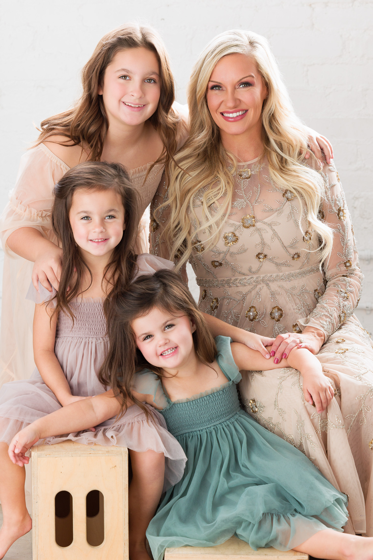 Family portrait of a mother and daughters in soft tones, AJK Images Dallas