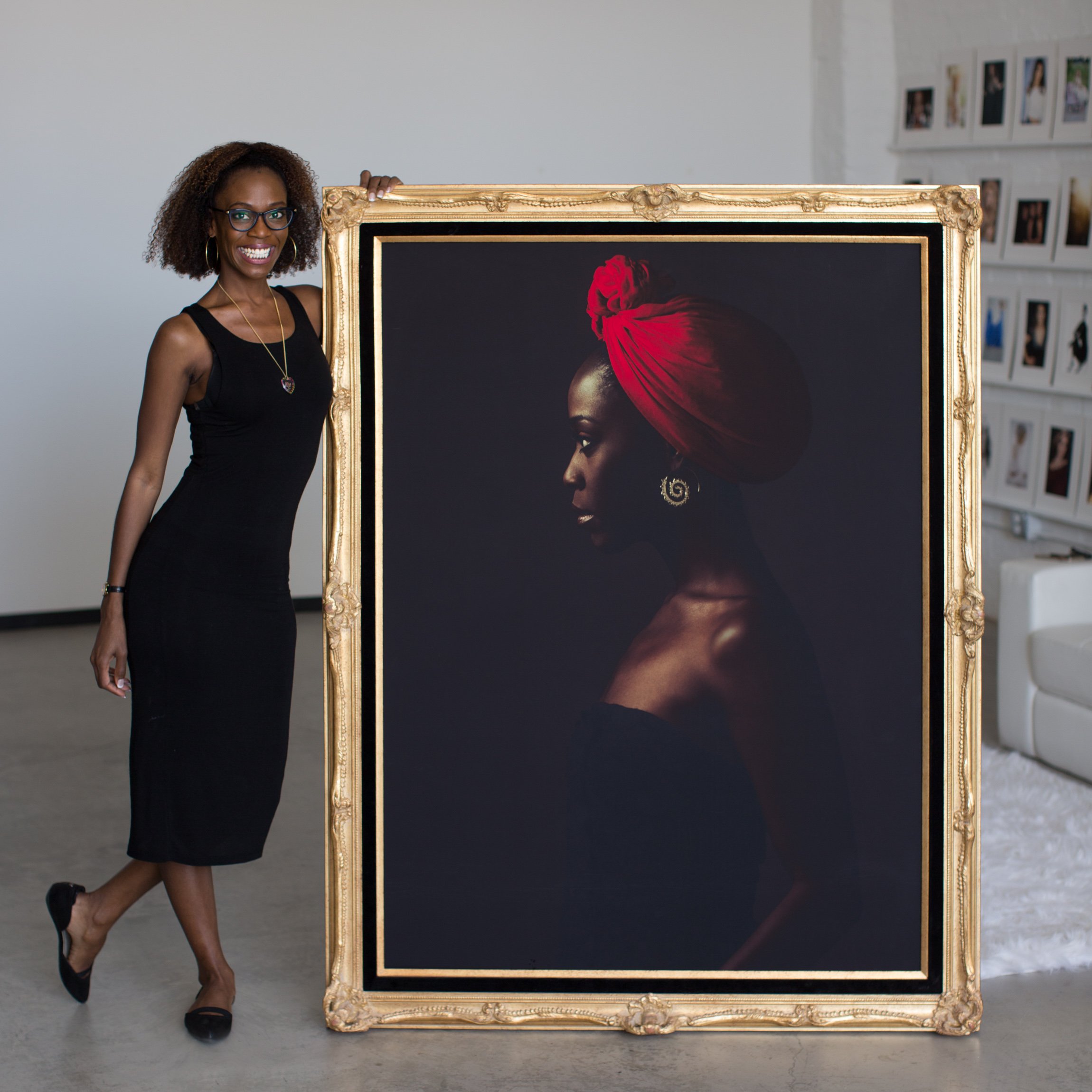 Client with her framed 40 by 55 inch heirloom wall portrait, printed and finished in-house by AJK Images, Dallas